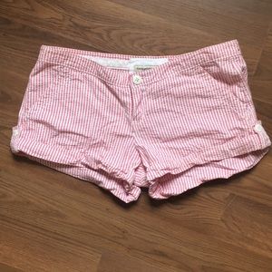 A pair of red and pink striped seersucker shorts